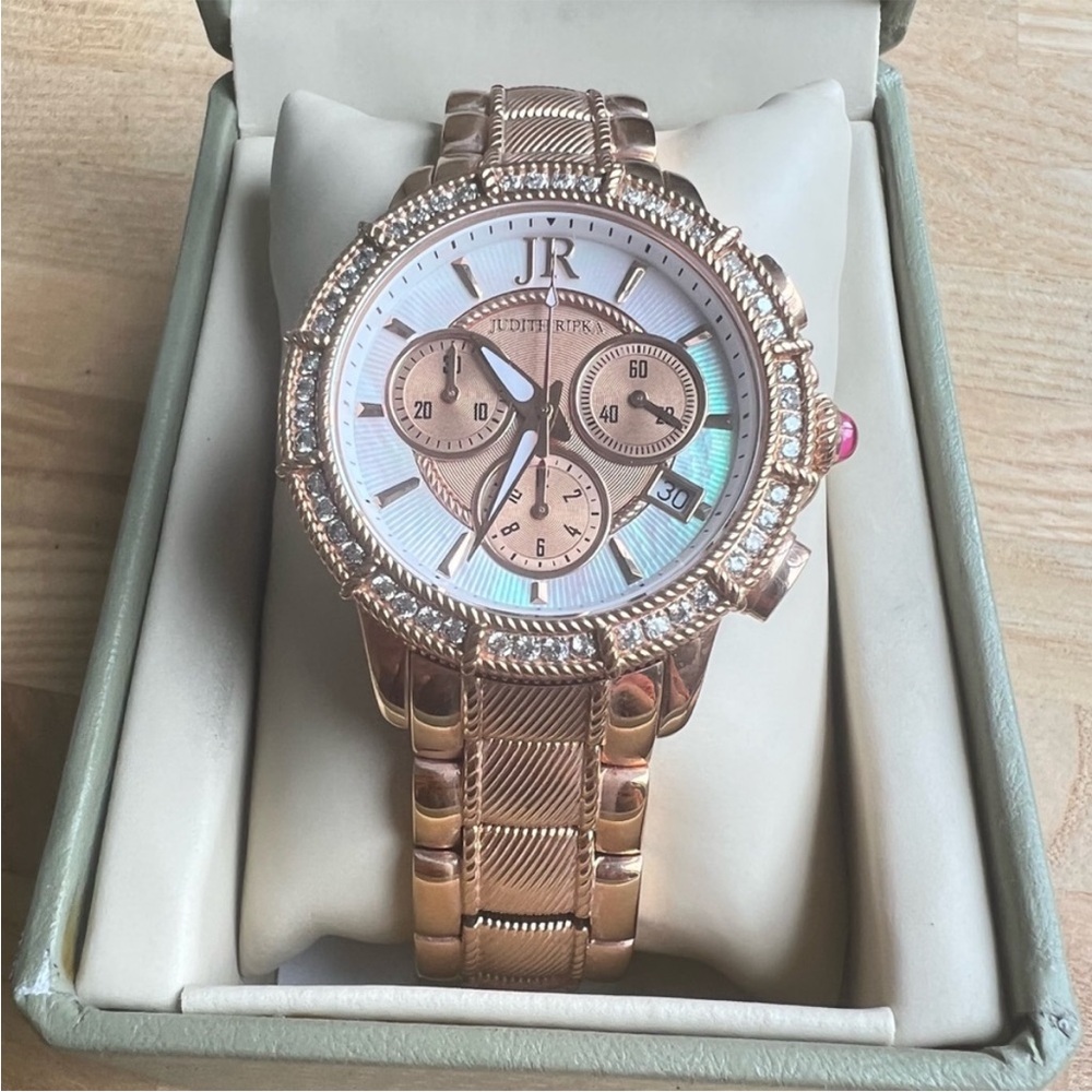 Judith Ripka ladies rose gold tone
Chronograph dress watch NEW BATTERY